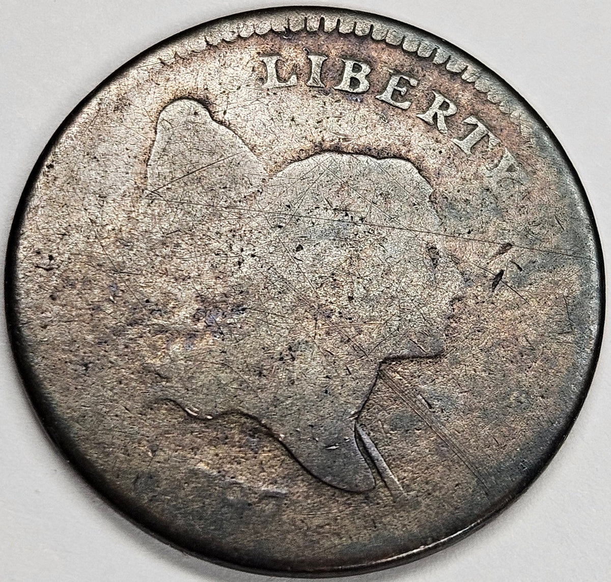 1797 Plain Edge Liberty Cap Half Cent . . . . AG low head