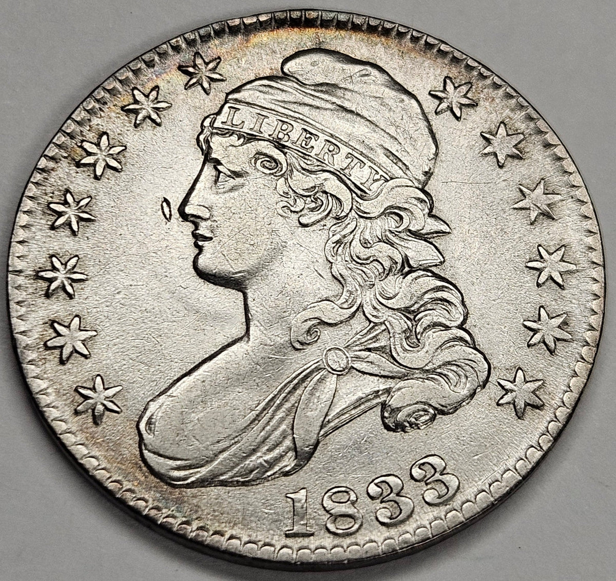 1833 Bust Half . . . . About Uncirculated