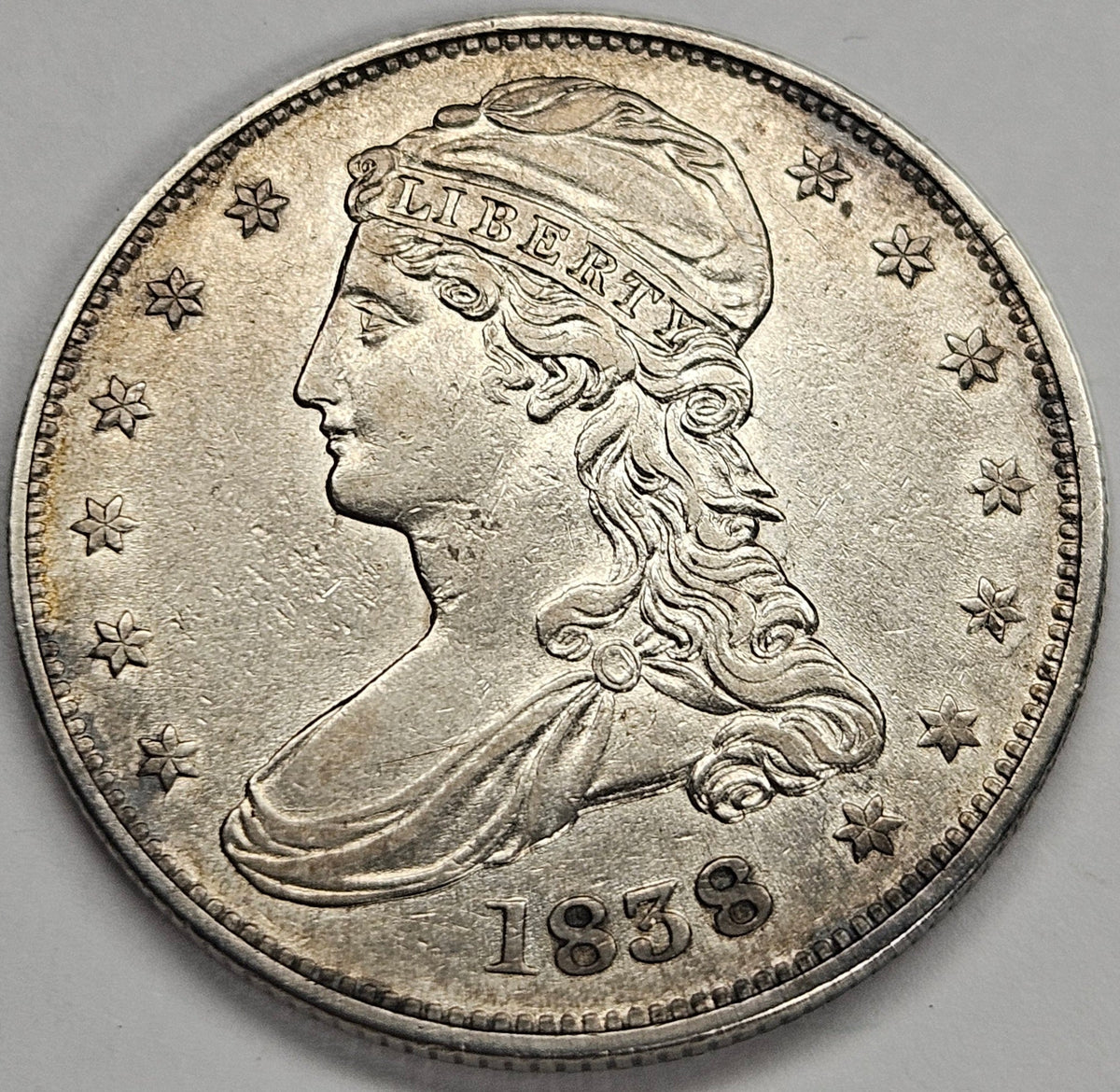 1838 Reeded Edge Bust Half . . . . About Uncirculated