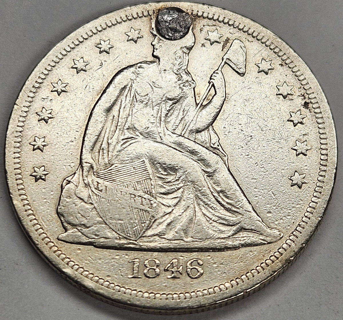 1846-O Seated Liberty Dollar . . . . XF plugged hole