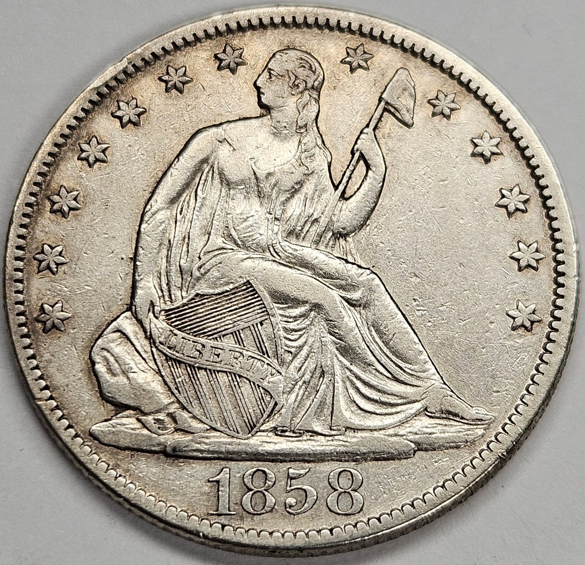 1858-O Seated Liberty Half . . . . Choice About Uncirculated