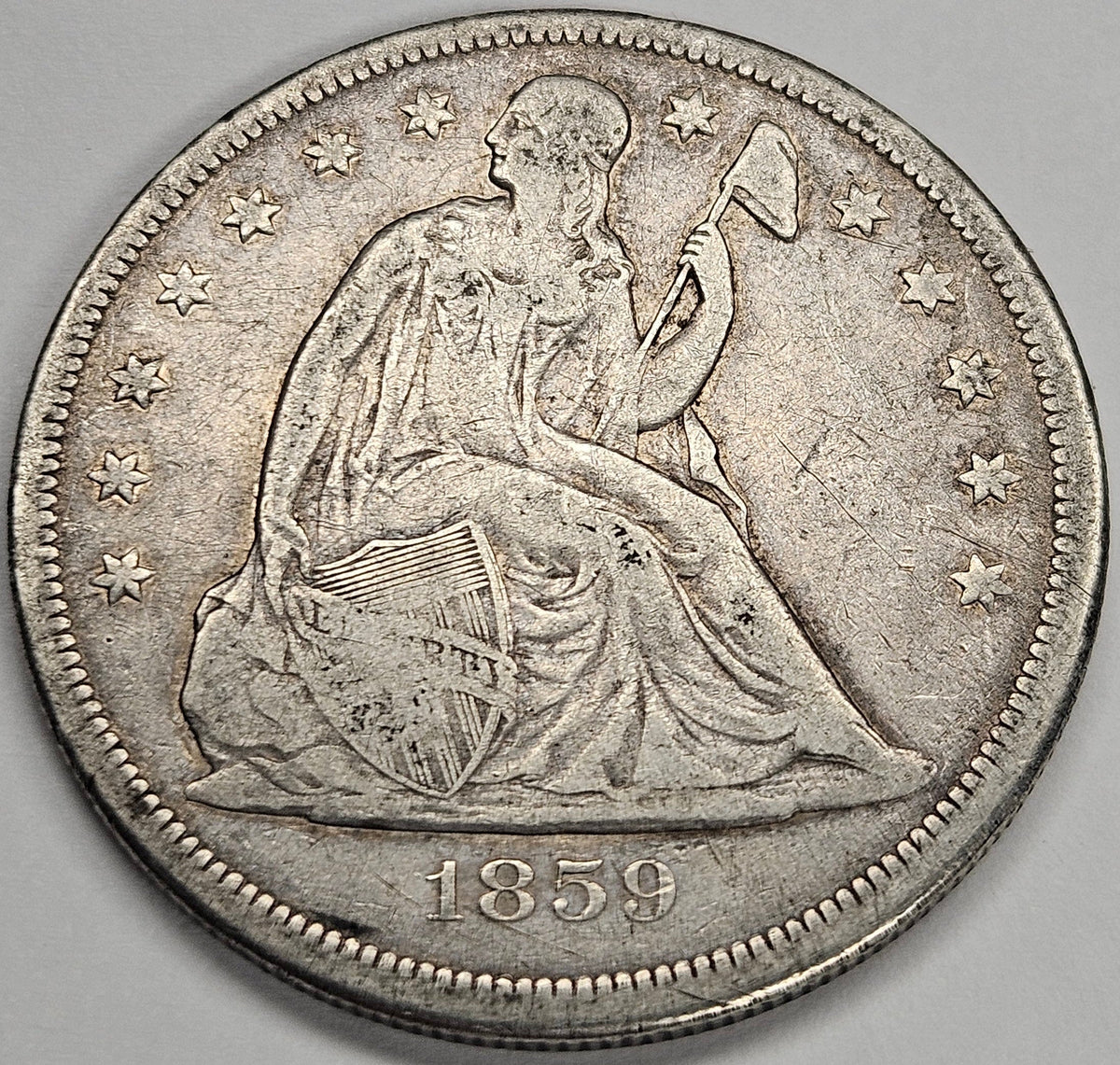 1859-O Seated Liberty Dollar . . . . Very Fine