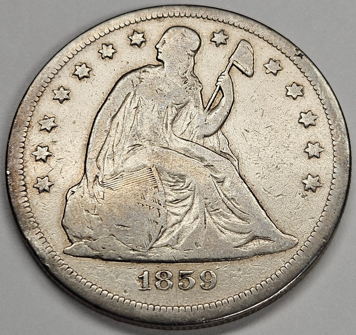1859-O Seated Liberty Dollar . . . . VG/Fine