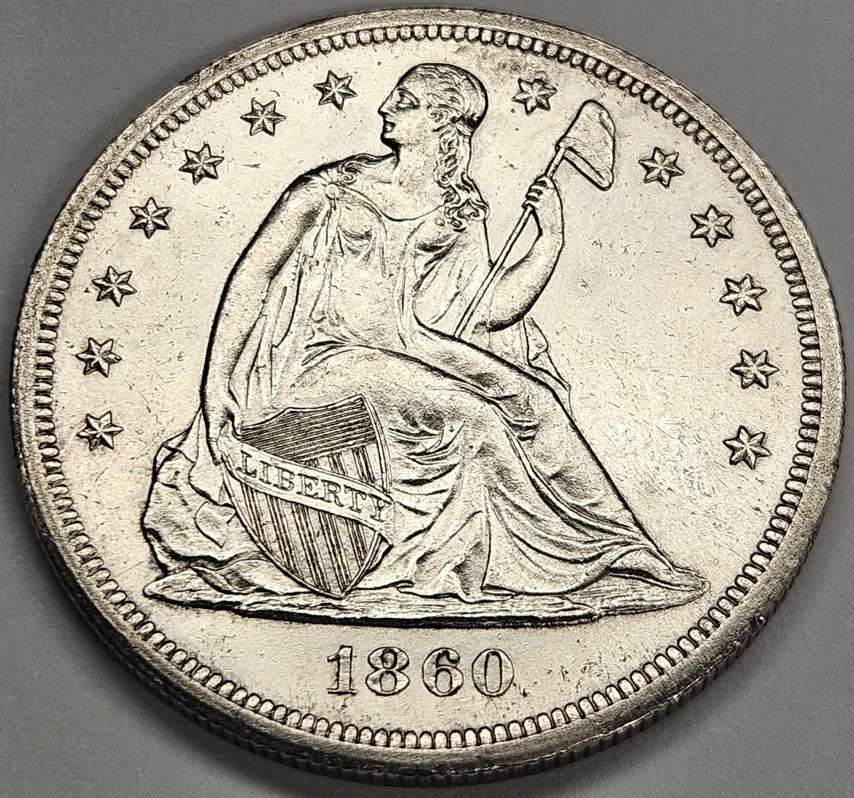 1860-O Seated Liberty Dollar . . . . Choice Brilliant Uncirculated