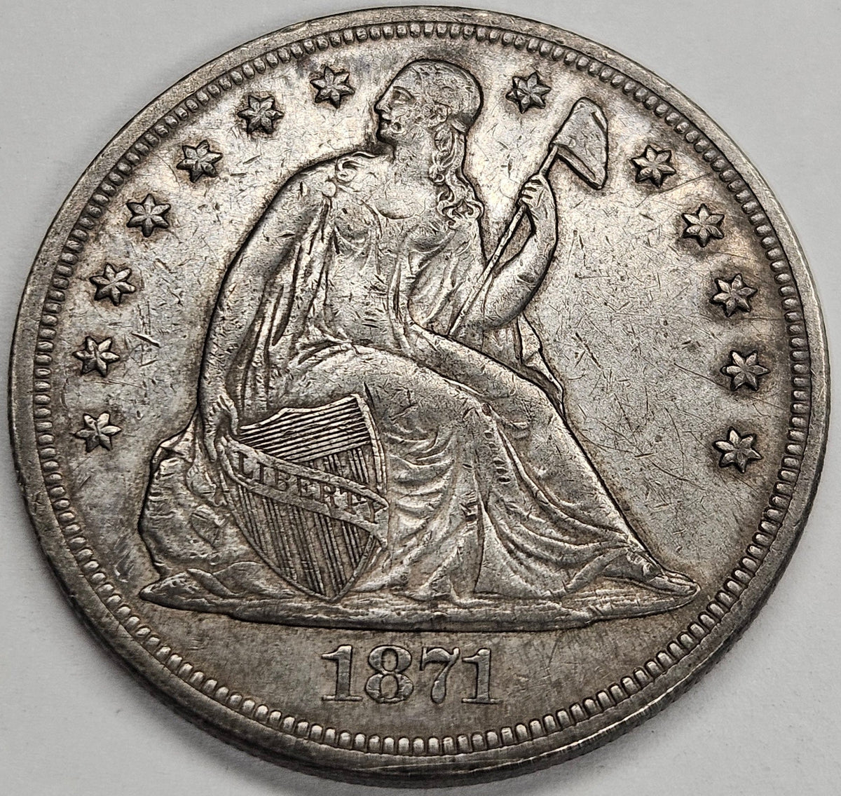 1871 Seated Liberty Dollar . . . . Choice About Uncirculated