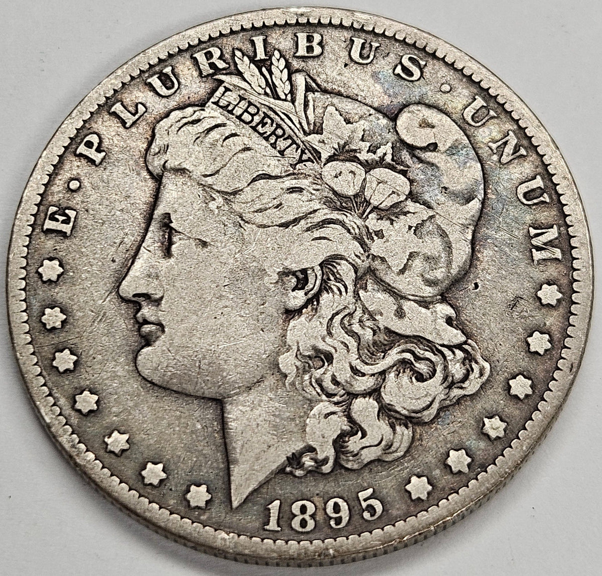 1895-O Morgan Dollar . . . . Fine