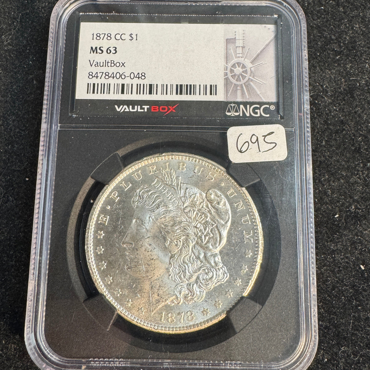 1878-CC Morgan Silver Dollar, Vaultbox NGC MS-63